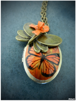 Oranje vlinder medaillon